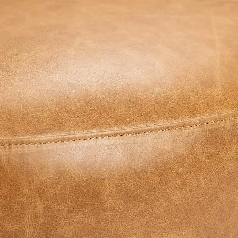 Sillón giratorio moderno de cuero genuino de grano superior con cojín