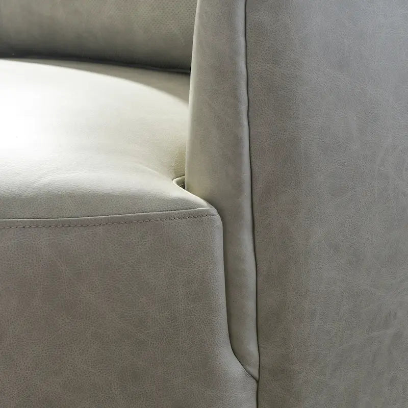 Sillón giratorio moderno de cuero genuino de grano superior con cojín