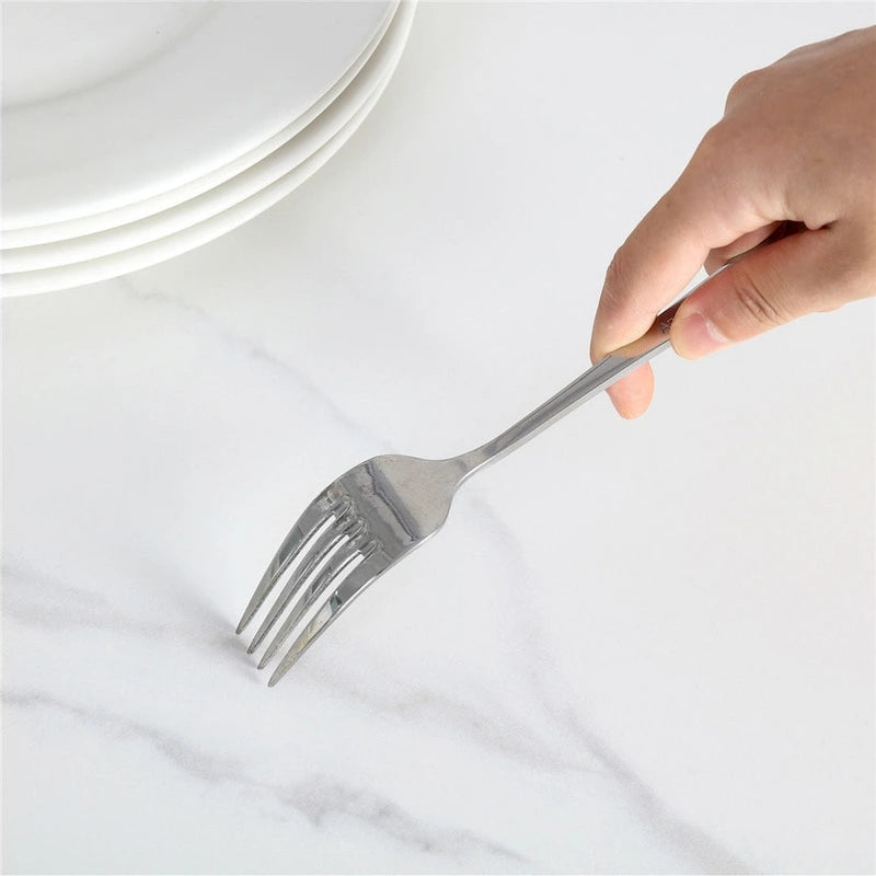 Mesa de comedor moderna cuadrada con tablero de piedra sinterizada y patas de metal negro